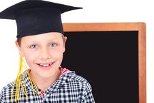 Graduate Boy In Cap With Blackboard In Background Stock Photo Graduate Boy In Cap With Blackboard In Background Stock Photo