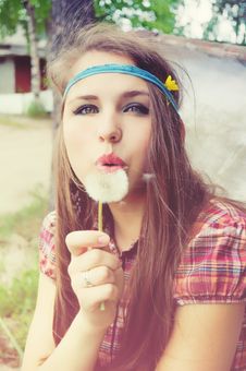 Girl Blowing A Dandelion Royalty Free Stock Images Girl Blowing A Dandelion Royalty Free Stock Images