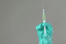 Syringe In Hand Stock Photo