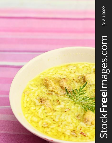 Asian style rice soup with herbs in a bowl