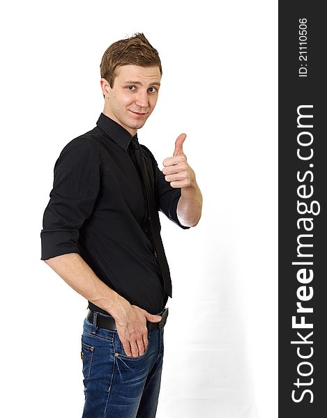 Happy casual young man showing thumb up