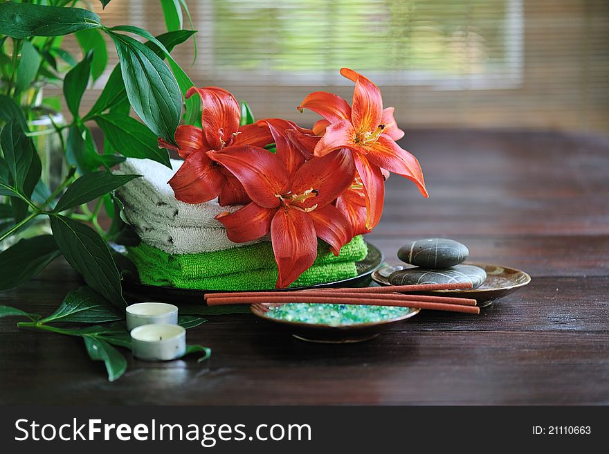 Items for spa with lily and foliage. Items for spa with lily and foliage