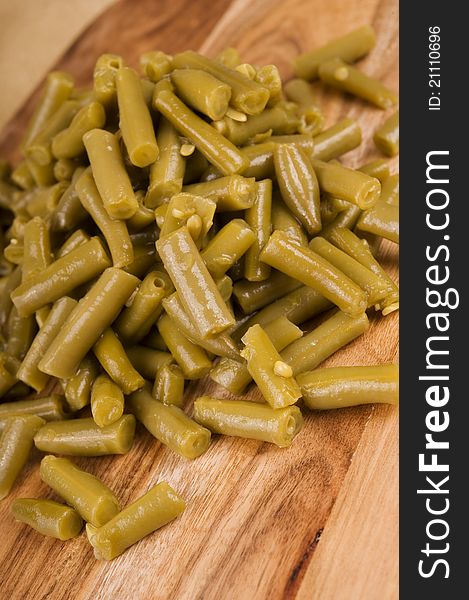 Sliced Green Beans on a wooden chopping board