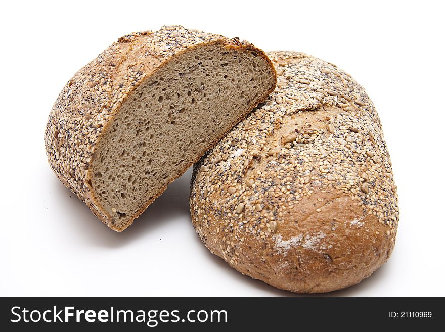 More grain bread baked and on white background