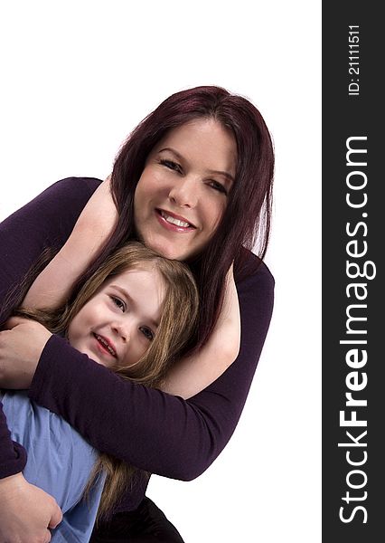 Portrait of a mother hugging and her baby girl. Portrait of a mother hugging and her baby girl