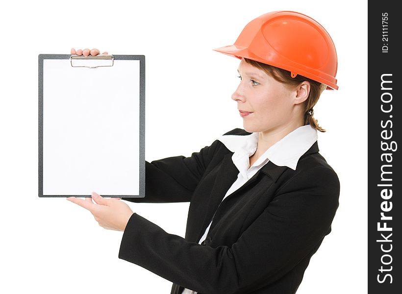 Businesswoman in a helmet shows the blank page on a white background. Businesswoman in a helmet shows the blank page on a white background.