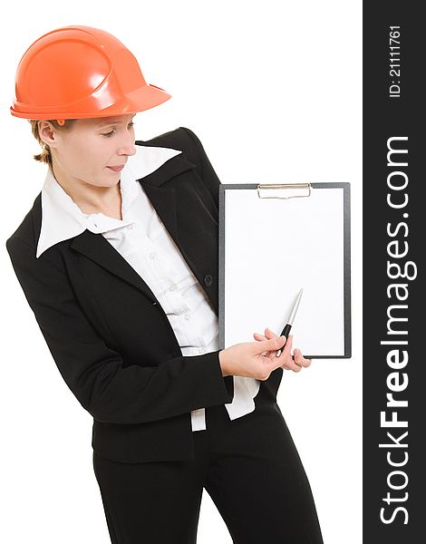 Businesswoman in a helmet shows the blank page on a white background. Businesswoman in a helmet shows the blank page on a white background.