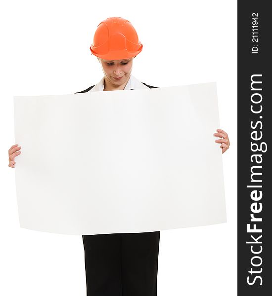 Businesswoman in a helmet shows the blank page.