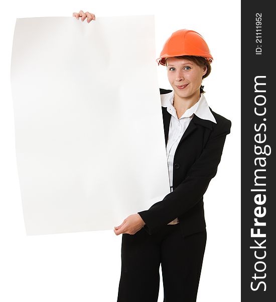 Businesswoman in a helmet shows the blank page.