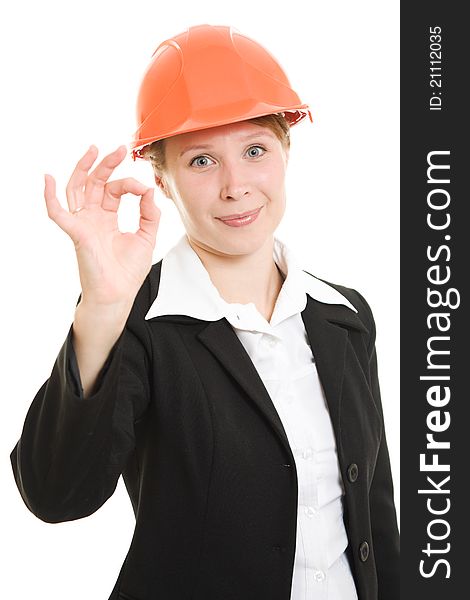 Happy businesswoman in a helmet on a white background.
