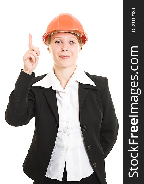 Businesswoman in a helmet shows a finger up on a white background. Businesswoman in a helmet shows a finger up on a white background.