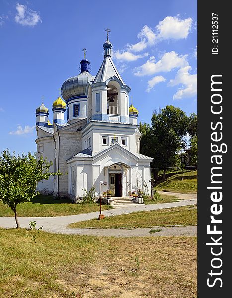 Garden and church of Hancu monastery near Chisinau in Republic of Moldova
