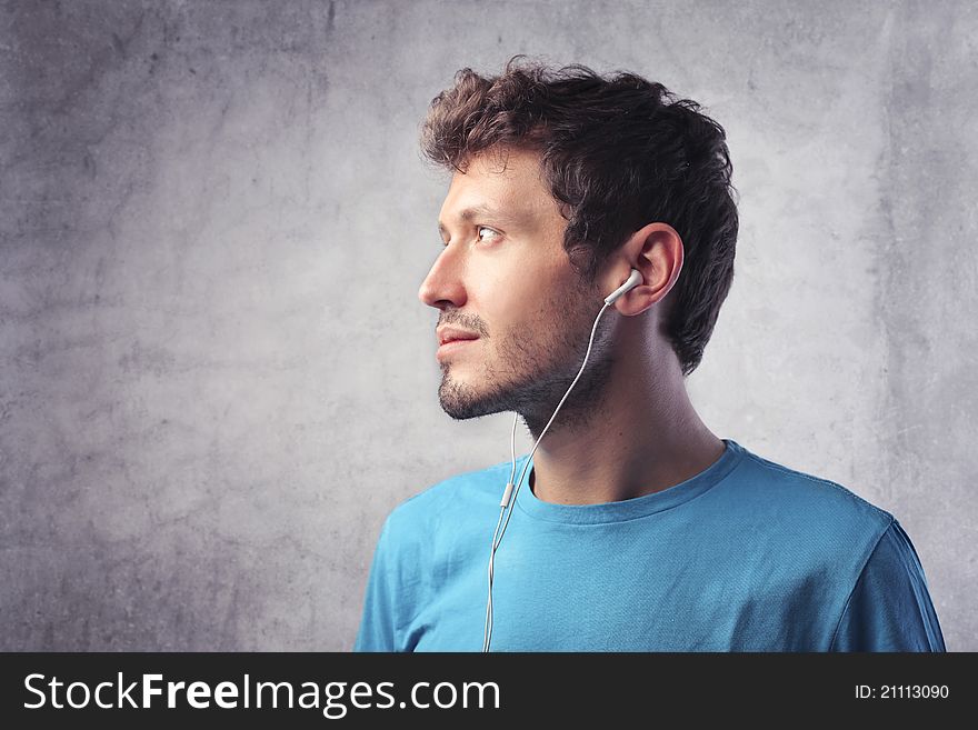 Young man listening to music