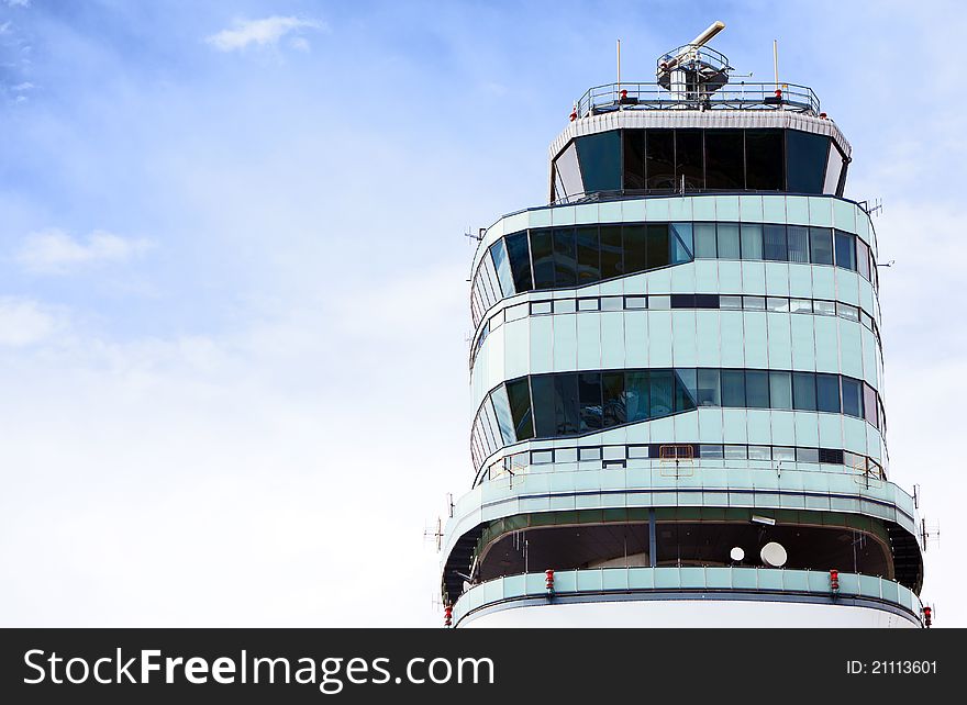 Air traffic control tower on sky