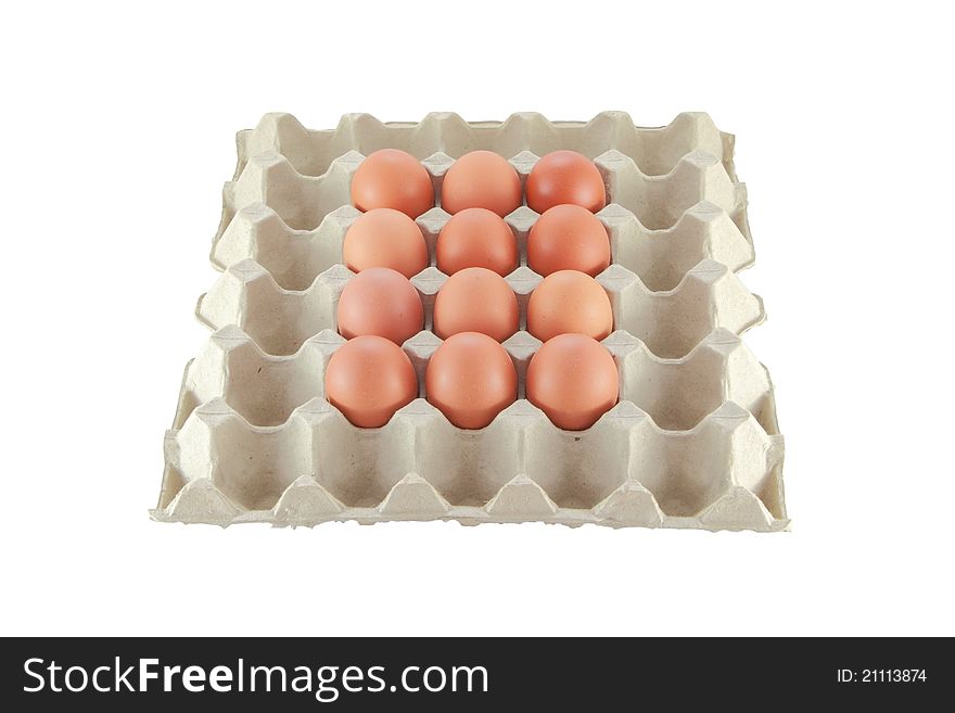 Twelve eggs in center of carton package.