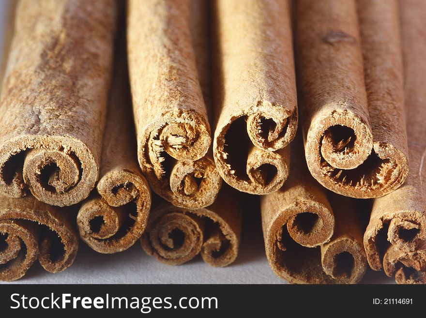 The cinnamon sticks on white background