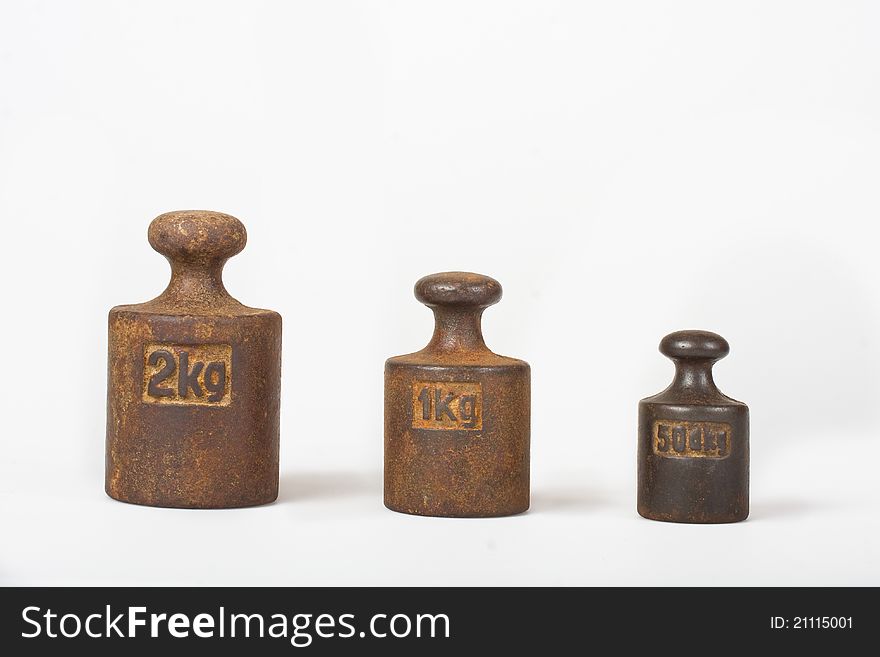 Three weights on a white background