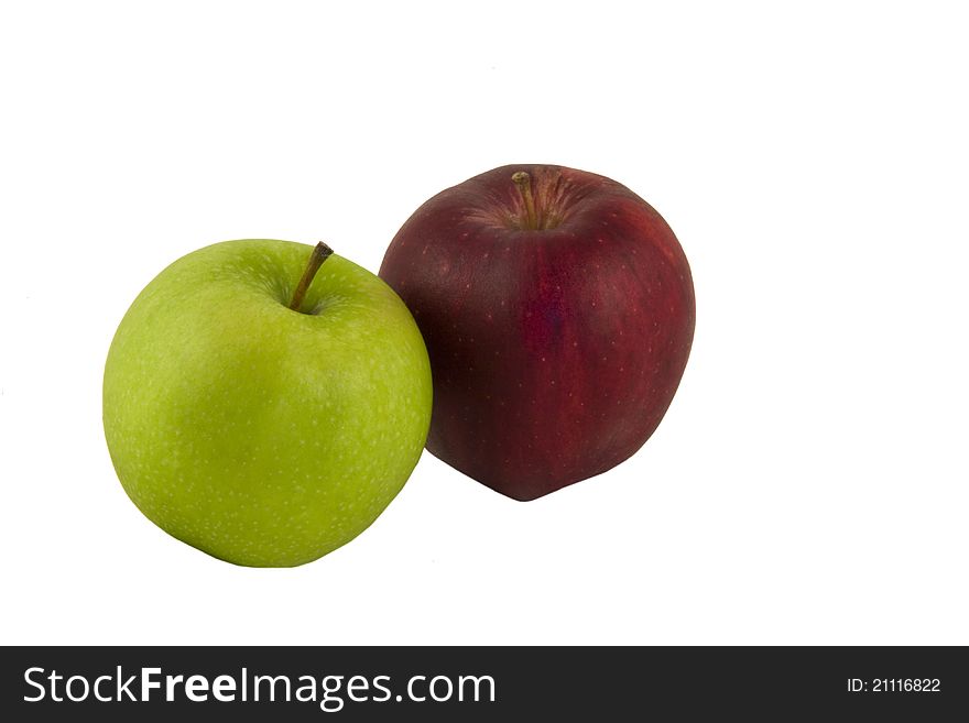 Green and red apples on the white background