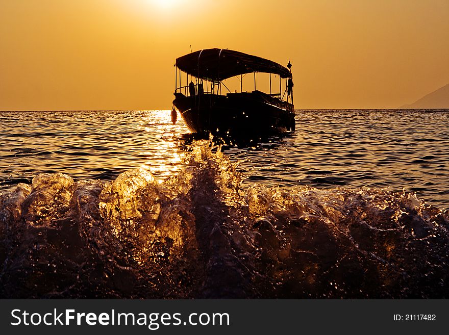 Sunset And Boat