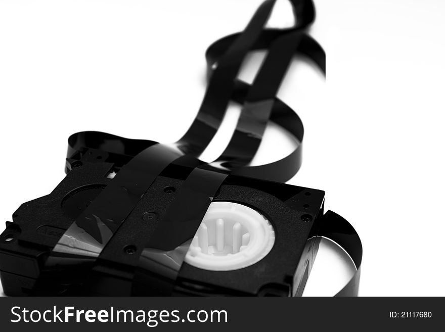 Isolated on white image of a cinema tape with departing film in the form of dollar