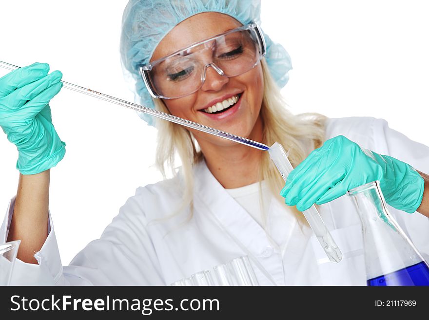 Woman conducting a chemical experimant. Woman conducting a chemical experimant
