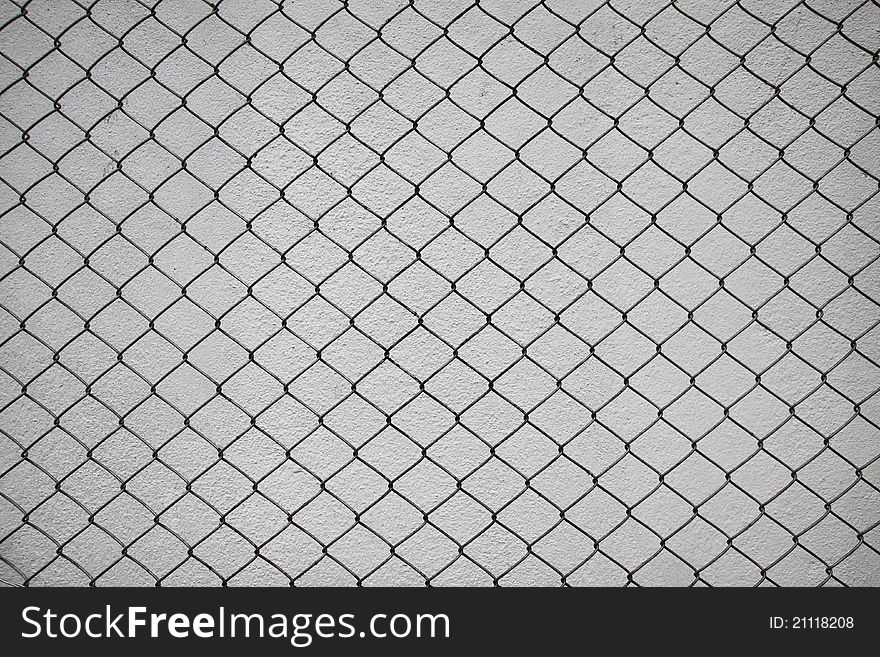 Iron net and white cement wall use for texture and background