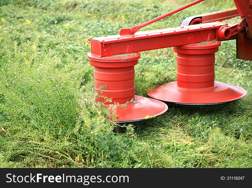 Image format of a tractor in the field clover. Image format of a tractor in the field clover