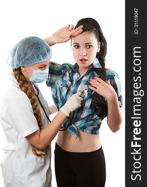 Doctor listening to patient with stethoscope