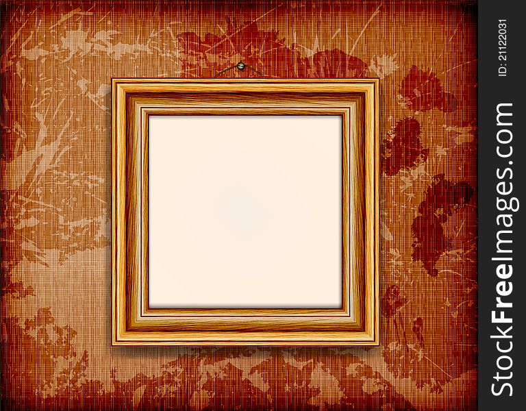 Old wooden frame for photo on the grunge fabric background