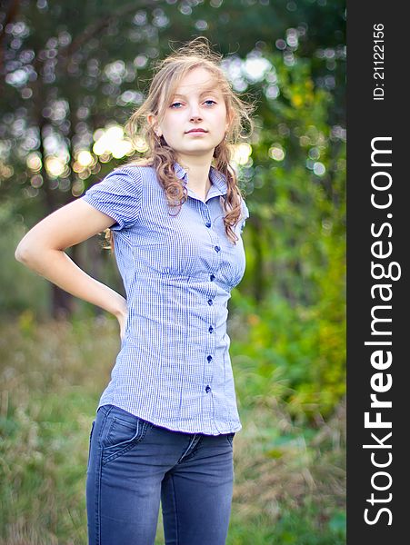 Portrait of young beautiful girl at summer green park. Portrait of young beautiful girl at summer green park