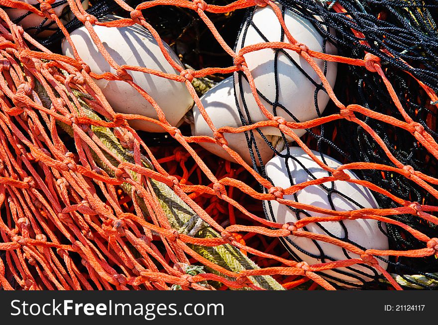 Close-up fishing net with floats on the background. Close-up fishing net with floats on the background.