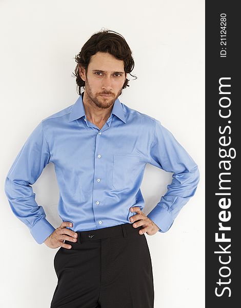 Portrait of a handsome businessman wearing a blue shirt. Portrait of a handsome businessman wearing a blue shirt