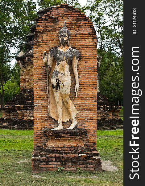 Buddha image statue at Sukhothai historical park, Thailand