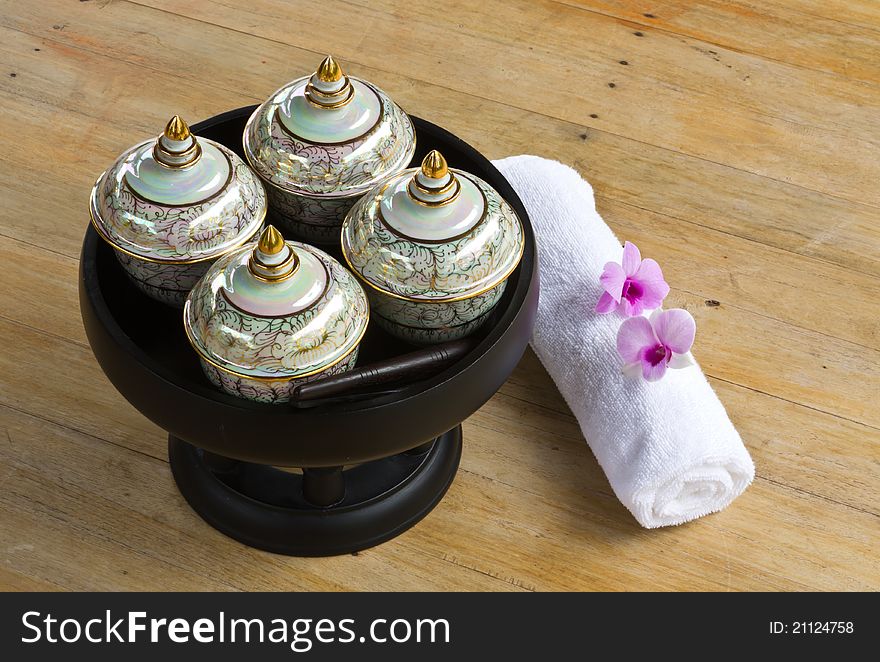 Porcelain use for contain massage oil and white towel. Porcelain use for contain massage oil and white towel