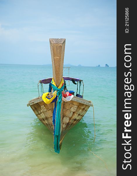 A traditional wooden longtail boat in Krabi, Thailand