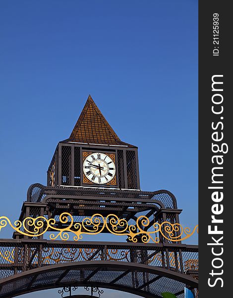 Clock tower against blue sky. Clock tower against blue sky