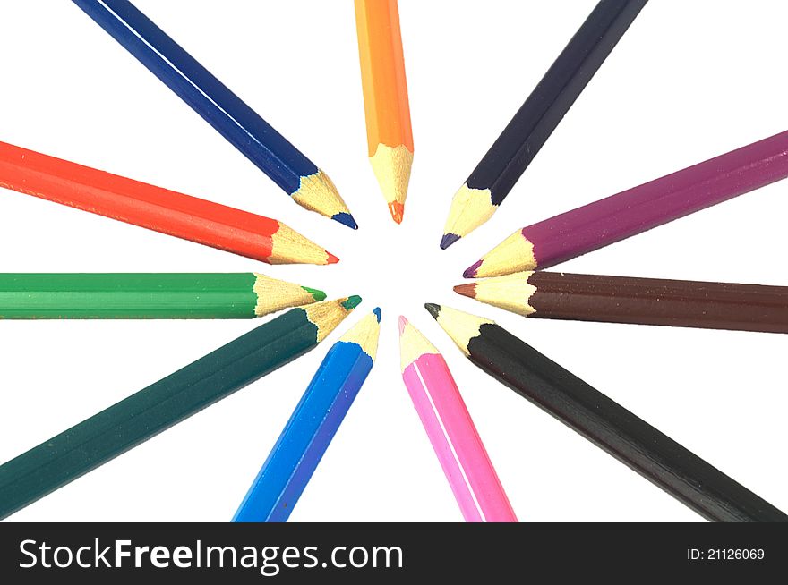 Coloured pencils in a circle like sun