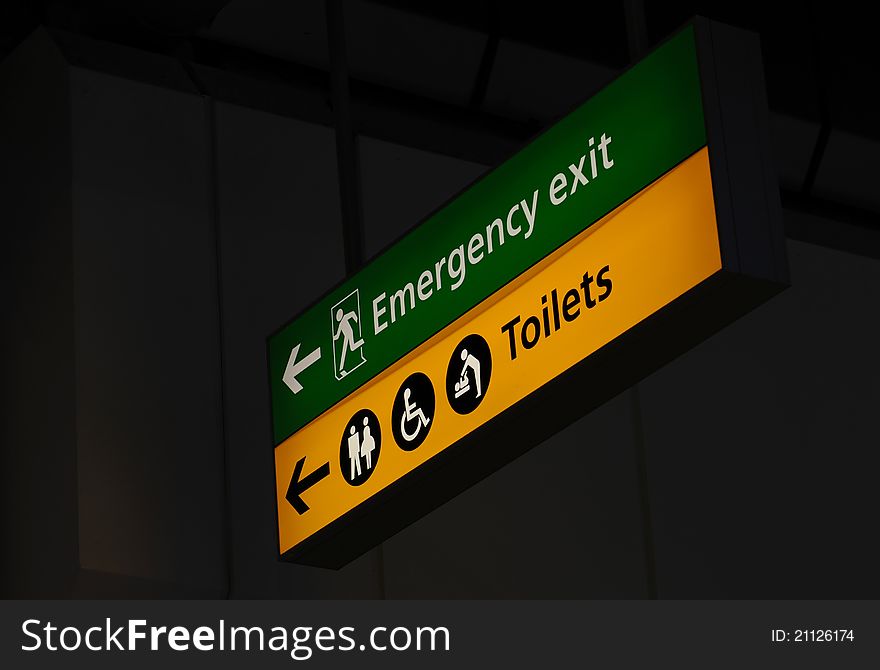 Airport emergency exit and toilet light sign. Airport emergency exit and toilet light sign