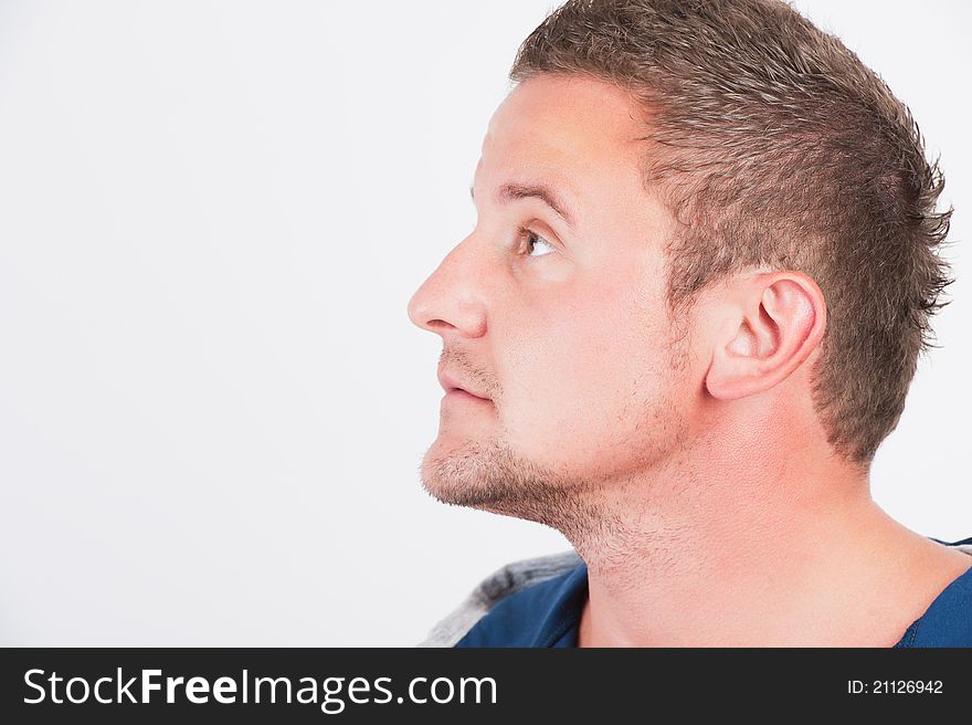 Attractive man close up portrait on white background