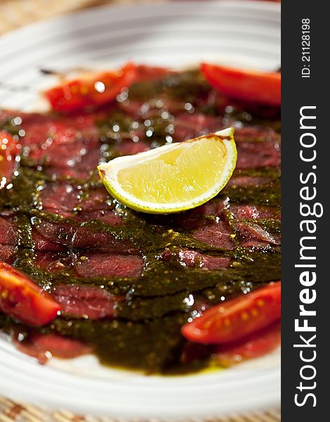 Beef Carpaccio with Tomatoes, Lime and Sauce. Beef Carpaccio with Tomatoes, Lime and Sauce