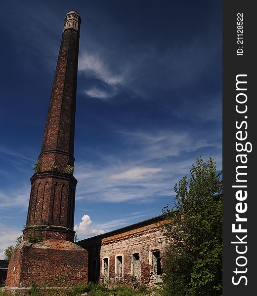 Brick chimney in komplex of and old mine called Alexander, Ostrava city, Czech republic