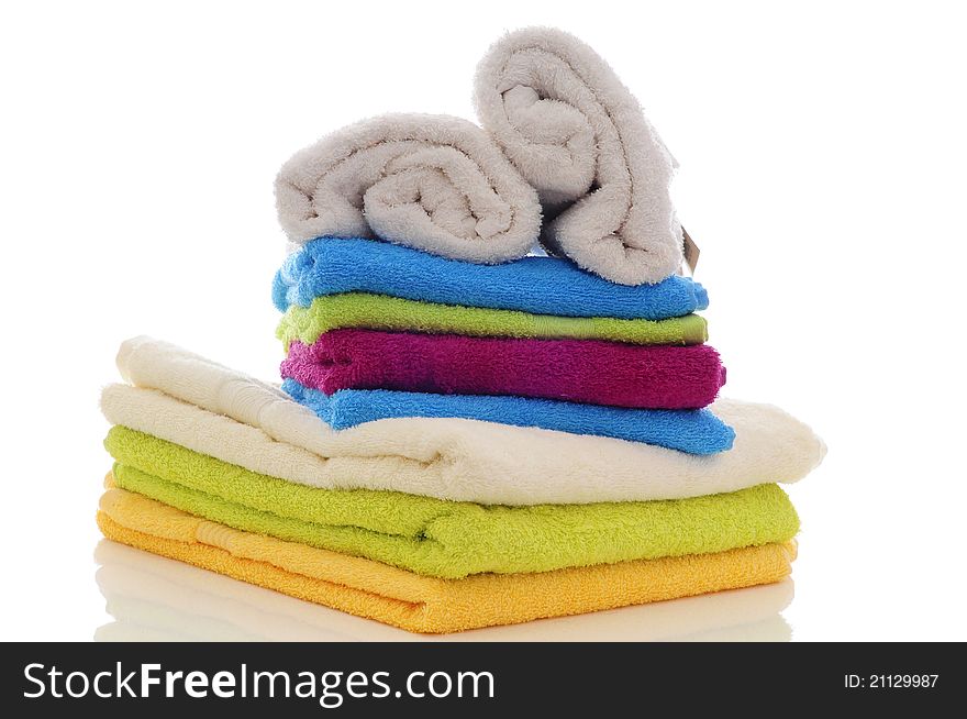 Colorful towels made in a studio with a white background. Colorful towels made in a studio with a white background