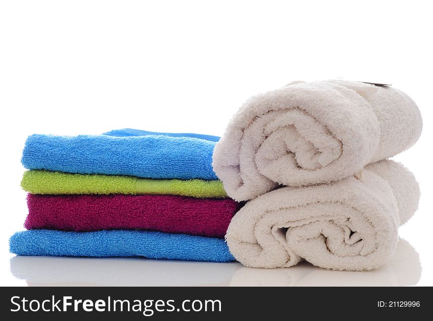 Colorful towels made in a studio with a white background. Colorful towels made in a studio with a white background