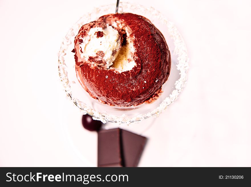 Chocolate ice-cream with coconut, dessert in a glass