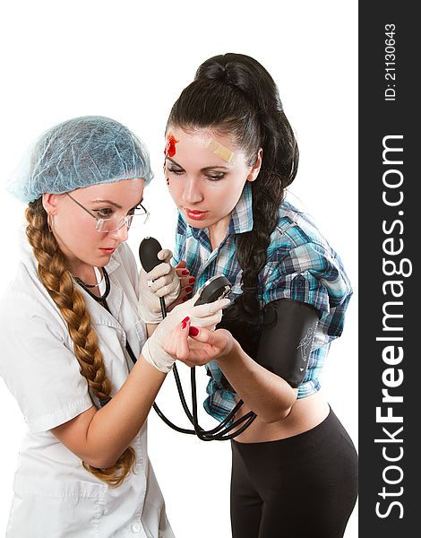 Nurse and patient looking at the Blood Pressure Monitor on a white background. Nurse and patient looking at the Blood Pressure Monitor on a white background