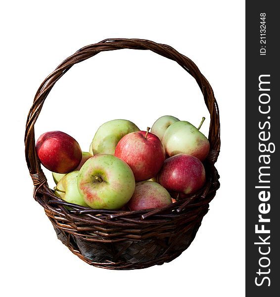 Basket of fresh red and green apples isolated on white background. Basket of fresh red and green apples isolated on white background