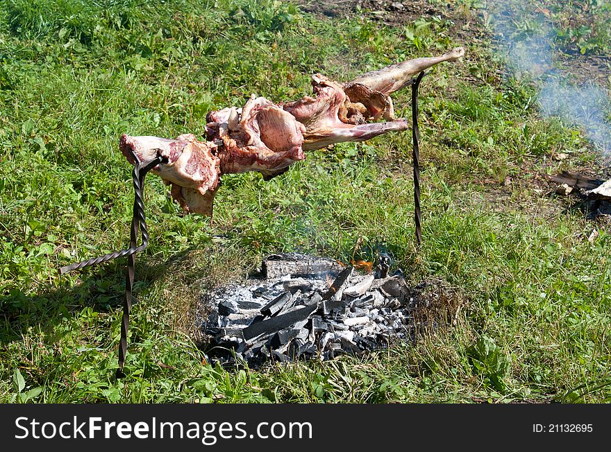 Preparing lamb barbecue on fire on holiday of harvest