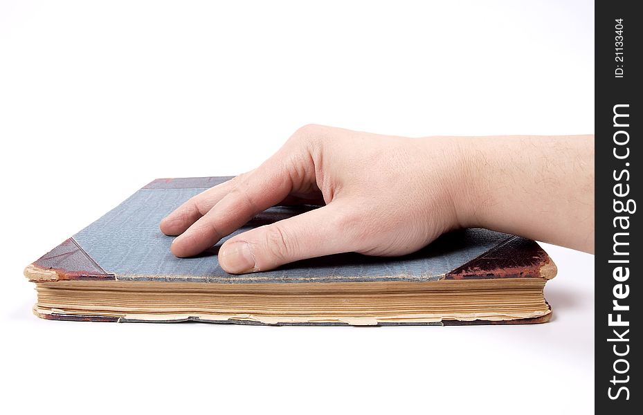 Color photo of an old book and hands. Color photo of an old book and hands