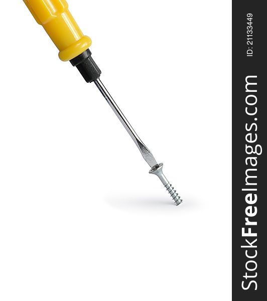 Industrial concept. Closeup of screwdriver and screw on white background. Isolated with clipping path. Industrial concept. Closeup of screwdriver and screw on white background. Isolated with clipping path
