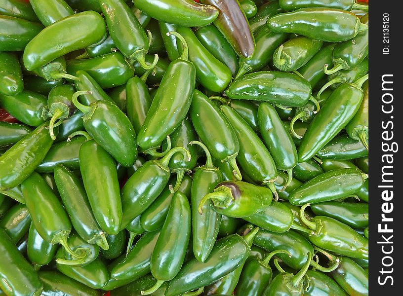 Green peppers for sale at a local farmers market